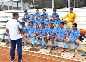 Coach Kiyoshi Sekiguchi gives final instructions to the CNMI U19 National Team players before their scrimmage against Assumption Christian College yesterday in Thailand. (Contributed Photo)