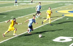 Enrico Del Rosario, second left, chases the ball in one of his games with Alderson Broaddus University in the NCAA Division II early this month. (Contributed Photo)