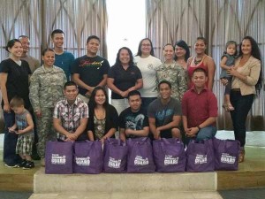 Guam Army National Guard soldiers that reside in the CNMI pose with members of the Guam Guard’s Family Readiness Group after accepting donations at the Kanoa Resort on Saipan on Monday, Sept. 21. (Contributed Photo)