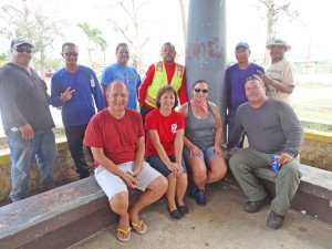 Members of the Herman’s Modern Bakery family treat power linemen to a large lunch at the Minatchom Atdao pavilion in Susupe. (Dennis B. Chan)