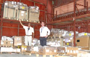 John Compton, chief operating officer, left, and Hans Mickelson, IT&E Marketing and Enterprise Sales manager, right, show off the new Ericsson equipment that has arrived on Saipan. (Contributed Photo)