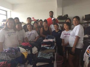 Rose Smith, founder of Empty Vessel Ministry, poses for a photo with volunteers while distributing relief supplies. (Contributed Photo)