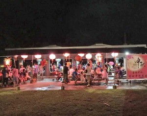 Lanterns lit the Carolinian Utt in Garapan as the Chinese Association of Saipan celebrated the Mid-Autumn Festival. Floating lanterns were also released to the sky and the sea. (Frauleine S. Villanueva)