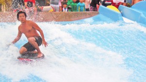 Kenji Tokado of Japan performs in the men’s Masters bodyboard event of last weekend’s 2015 Point Break Open held at the Pacific Islands Club’s flowrider facility in San Antonio. Tokado finished second to Kim Jin Woo. (Mackenzie Rae Perez)
