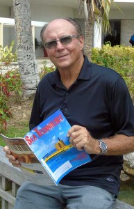 Pacific Subsea Saipan Inc.’s chief executive officer Jack McClure shows off the Sea Technology magazine where their submarine was featured. (Frauleine S. Villanueva)