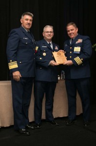 Officers of the U.S. Coast Guard cutter Morgenthau show off The Capt. Hopley Yeaton Cutter Excellence Award that was presented to cutter crews that distinguish themselves from other units through exceptional performance. (Contributed Photo)