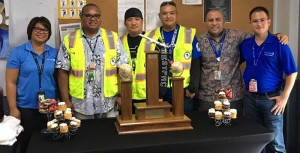 The winning Team Guam members included Eddie Olkeriil, Tom Daga, Rick San Nicolas, and Joe Rapanut. They received individual trophies, a team trophy, and tablets as Ramp Rodeo champions. (UNITED AIRLINES)
