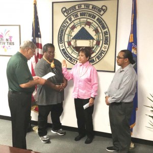 Saipan and Northern Islands Municipal Council member is sworn in by Saipan Mayor David M. Apatang as council chair L.J. Castro, right, and vice chair Diego Kaipat look on during the short ceremony at the Mayor’s Office yesterday. (Mark Rabago)