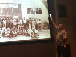 Steven Connor points to the original quonset that used to bottle Coca-Cola on Saipan. Posing in front of the structure are American GIs and embarrassed Japanese prisoners of war believed to be conscripted to help set up the structure. (Mark Rabago)