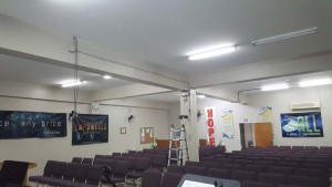 Photo shows the inside of the Grace Christian Assembly church in San Antonio where a ladder was left in the middle of the church after burglars used it to remove a monitor and a projector over the weekend.  Several others items and coins all worth over $4,000 were stolen. (Contributed Photo)