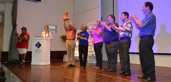 Marianas tourism industry pioneer David M. Sablan receives a plaque of appreciation at the Marianas Tourism Education Council Tourism Summit on Jan. 26, 2017, at Fiesta Resort & Spa. Pictured from left are MTEC board members Gordon Marciano and Catherine Perry Harris, Sablan, and MTEC chair Vicky Benavente, vice chair Wendi Herring, member Glenn Policare, treasurer Shamika Ratwani, and secretary Martin Duenas. (MTEC)