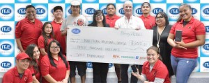 IT&E Sales and Marketing manager Hans Mickelson, fourth from right, standing, and IT&E Customer Service manager Janice Tenorio, second from right, present a donation of $3,000 and a Samsung Galaxy S7 to Northern Marianas College president Dr. Carmen Fernandez, sixth from right, standing, and NMC students. The donation was made as part of the NMC Foundation’s Annual Golf Tournament scheduled for March 18, 2017. (Contributed Photo)