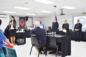 Supreme Court justices, with the help of two attorneys that presented their arguments in a hearing conducted at the Northern Marianas College, hold a question-and-answer portion after the hearing yesterday. From left, attorney Janet King, attorney Stephen Nutting (seated), Supreme Court Associate Justice John Manglona, Chief Justice Alexandro Castro, and Associate Justice Perry Inos. (Erwin Encinares)