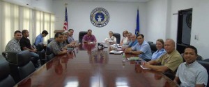 Gov. Ralph DLG Torres, fifth left, and Joint Region Marianas commander Rear Adm. Shoshanna Chatfield, sixth left, led both panels in yesterday's meeting to discuss the U.S. Department of Defense's military plans in the region. (Jon Perez)