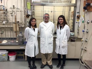 University of Guam biology majors Ana Capati and Aubriana Perez conduct research at the University of Rochester in New York alongside mentor and UOG chemistry professor Dr. Naushadalli Suleman. From left to right: Capati, Suleman, and Perez stand in a lab at the University of Rochester. (Contributed Photo)