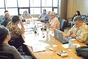 Gov. Ralph DLG Torres sits in with Commonwealth Ports Authority board members to discuss airport matters. (Erwin Encinares)