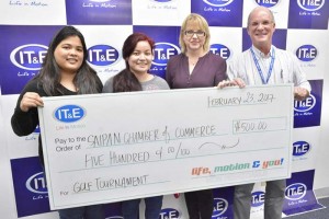 IT&E presents over $1,000 in cash and in-kind donations to the Saipan Chamber of Commerce. In photo, from left to right, are IT&E marketing coordinator Daisy Demapan, Chamber administrator/coordinator Mercilynn Kaneshi Palec, Chamber executive director Jill Arenovski, and Sales & Marketing manager Hans Mickelson. (Contributed Photo)