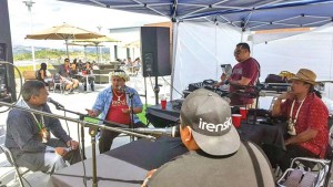 Gov. Ralph DLG Torres, second from left, gestures during an interview at the 8th Annual Chamorro Cultural Festival over the weekend at the California State University-San Marcos grounds. At left is Guam Gov. Eddie B. Calvo. (Contributed Photo)