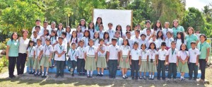 Green Meadow School students, principal Milagros Songcuan, and teachers-coaches pose for a photo after their successful participation in the regional Primary Grade Forensic Competition last Saturday at Grace Christian Academy. (Contributed Photo)