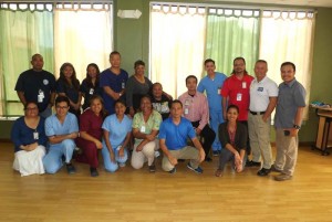 Far left, Jeffrey Sablan (immunization vaccine specialist) and Hilma Castro (Marianas Health Home Care, quality assurance assistant) pose for a group photo with Hervin Jacinto (MHS, quality assurance officer), Peter Judicpa (regional public health adviser of immunization at the Centers for Disease Control and Prevention), Arvin Deleon Guerrero (Immunization VFC coordinator), Jeremy Sasamoto (immunization program manager), and Marianas Health Home Care nurses. (Contributed Photo)