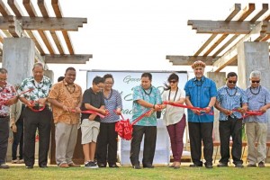Gov. Ralph DLG Torres, sixth left, and acting Assistant Secretary for Insular Areas Nikolao Pula, third right, lead the ribbon cutting of the Gov. Eloy S. Inos Peace Park last Friday. (Jon Perez)