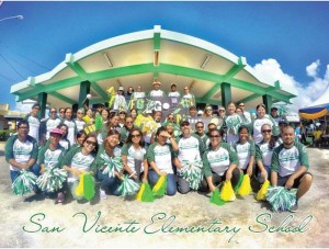 School principal Paulette Tomokane-Sablan, center front row, and her San Vicente Elementary School family. (Contributed Photo)