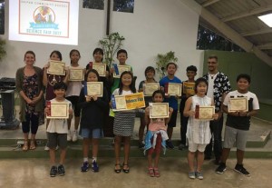Winners of Saipan Community School’s 2017 STEM Fair pose with principal Amanda Dunn and science and math teacher T.J. Van. (Saipan Tribune)