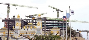 The Imperial Pacific Resort's facade is slowly showing its final design with workers hurrying up the construction of the multimillion dollar integrated resort for a possible March 31 opening of the casino floor. (Jon Perez)