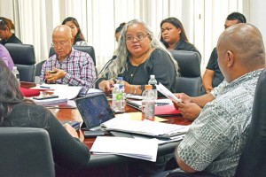 Imperial Pacific International (CNMI) LLC senior vice president for special projects Viola Alepuyo, center, addresses the Commonwealth Lottery Commission, chaired by Commerce Secretary Mark O. Rabauliman, in yesterday’s meeting at the Governor’s Office conference room. (Jon Perez)