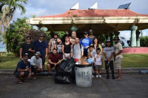 Commonwealth Office of Transit Authority special assistant for Public Transportation Alfreda Camacho joins her management staff in last week's beach cleanup. The group began their cleanup from Micro Beach to Paseo de Marianas, the heart of Garapan's tourist district. (Jon Perez)