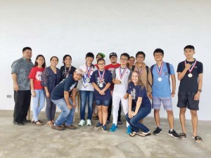 From left, Public School System teacher representative Paul Miura, CNMI Mathcourt champion Claire Song of Agape Christian School, Su Rui Huang of Saipan International School, former CNMI State teacher of the year Dora Miura, Enjie Hu of ACS, Dave Jang of SIS, Myungjae Cho of SIS, and Chen Xi Zhao of ACS. ACS coach Frederick Guintu and SIS coach Kacey Deatrich are posing with the CNMI team in the front row. (Contributed Photo)