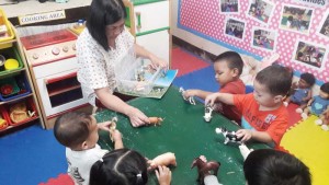 A childcare provider engages young children in an education play activity. The CNMI Child Care Providers Association will celebrate Providers’ Week starting tomorrow. (Contributed Photo)