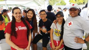 American Red Cross-NMI Chapter board members Patty P. McDonald and Nola Hix with student volunteers. (Contributed Photo)