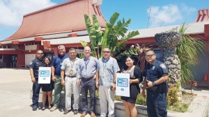 Fourth from left, airport manager Ed Mendiola, sales and marketing manager Hans Mickelson, and CPA executive director Chris Tenorio, along with CPA staff, pose to celebrate the launch of IT&E's free airport WiFi for arriving passengers. (Contributed Photo)