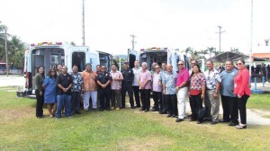 Gov. Ralph DLG Torres, Lt. Gov. Victor Hocog, and Department of Fire and Emergency Medical Services Commissioner Claudio K. Norita have a group photo with Cabinet members, government officials, lawmakers, and DFEMS personnel during the blessing of two new ambulances for Saipan at the Garapan fire station yesterday morning. (Ferdie de la Torre)
