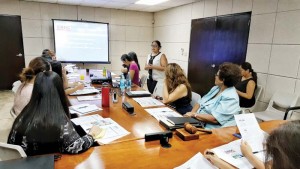 Nicole Babauta of the Small Business Development Center, standing, gives an introduction to participants on what to expect in the workshops.(Bea Cabrera)