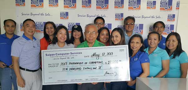 Saipan Computer Services, Business Development director Jerry Tiu, managing director Kazuko Kawabe-Tiu, and director Jose C. Tiu (2nd, 4th, and 6th from left) present a $10,000 donation to the organizers of the 2017 Governor’s Tournament of Champions. Also, in photo are Team SCS and Team NikeGolf. The upcoming Governor’s Tournament of Champion will be held on May 27 and 28, 2017 at the Laolao Golf & Resort. (Contributed Photo) 