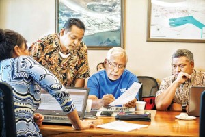 Commonwealth Ports Authority board members Barrie Toves, Pete Reyes, Clarence Tenorio, and Kimberly King-Hinds talk about the resolution to suspend new international flights into the CNMI.(Bea Cabrera)