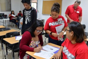 Northern Marianas College Admissions & Records counselor Lisa Rafael assists a participant in filling up an NMC application form during the recent Cash for College workshop held last Saturday. The next Cash for College workshop will be held on Tinian tomorrow, June 20, 2017, from 9am to 2pm and on Rota on Thursday, June 22, 2017, from 10am to 2pm. (NMC)
