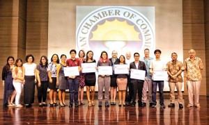 The 2017 Saipan Chamber of Commerce scholars pose with Chamber officers and Education Committee members. (Bea Cabrera)