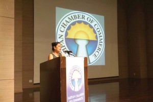 Saipan Chamber of Commerce president Velma Palacios speaks at yesterday’s meeting at the Saipan World Resort. (Bea Cabrera)