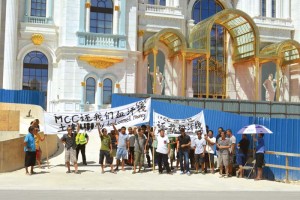 MCC International, Suzhou Gold Mantis Construction Decoration, CMC Macau, and Beilida International (CNMI) Ltd. workers protest about not being paid. They chanted, “We want our money! We want to go home!” (Erwin Encinares)