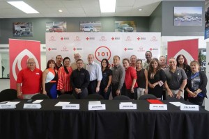 Jonathan Kriegel, president and chief executive officer of Docomo Pacific, seventh from left, is joined by American Red Cross Guam Chapter members and officials. (Contributed Photo)