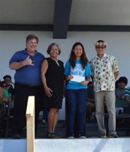 Marianas Tourism Education Council scholar Reynafe Aniga receives a $1,000 scholarship on May 24, 2017, at Saipan Southern High School. Pictured from left are MTEC board member Glenn Policare, MTEC chair Vicky Benavente, Aniga, and MTEC board member Larry Lee. (MTEC)