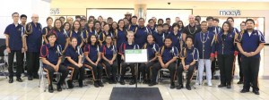 Guam Territorial Band members stand with Maximo Ronquillo Jr., chief band director, and Landon Aydlett, public relations officer, during a Håfa Adai Pledge ceremony on Monday, July 24, 2017.The Håfa Adai Pledge program is a cornerstone of the Guam Visitors Bureau’s local community branding campaign. (GUAM VISITORS BUREAU)
