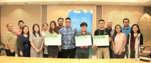 Guam Visitors Bureau staff surround Catherine Bungabong, independent business consultant; Tony Muna Jr., GVB vice president; Han Sol Seo, New M.W. Corp. operations manager; and Francis Valencia, The Boka Box representative, during a Håfa Adai Pledge ceremony on Monday, July 17, 2017. The Håfa Adai Pledge program is a cornerstone of the Guam Visitors Bureau’s local community branding campaign. (GUAM VISITORS BUREAU)