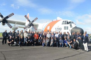 Members of the Pacific Search and Rescue Steering Committee stand with the U.S. Coast Guard HC-130 Hercules airplane in Auckland, New Zealand May 23, 2017. The committee is working to build SAR capability and cooperation across the Pacific to work together seamlessly to save lives. (U.S. COAST GUARD /PETTY OFFICER 3RD CLASS AMANDA LEVASSEUR)