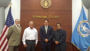 From left, Office of the Attorney General Civil Division chief Christopher Timmons, Attorney General Edward Manibusan, Hessel Yntema, and Chief Justice Alexandro C. Castro. (Contributed Photo)