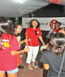 Festivalgoers of all ages enjoy the Japanese game “kendama” at the International Festival of Cultures on Sept. 3, 2016, on Saipan. The festival will feature more ethnic games when it returns every Saturday in September from 5pm to 9pm at Garapan Fishing Base, in addition to hands-on demonstrations, live performances, arts and crafts sales, ethnic cuisine, and more. (MVA)