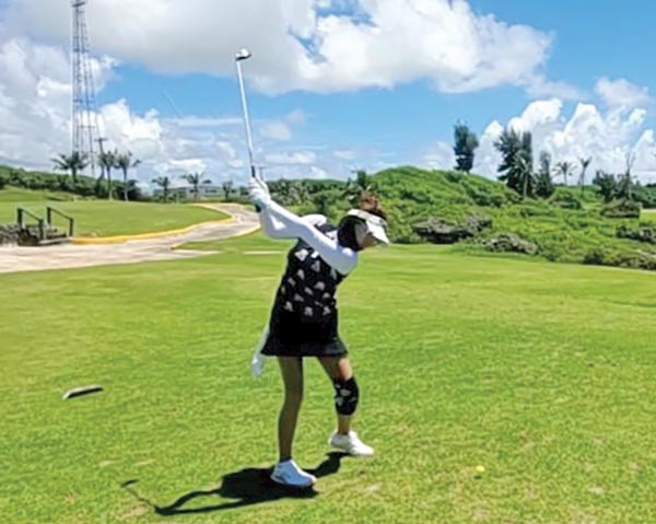 Son Hyun swings from the greens during CNMI Women’s Golf Association September ace